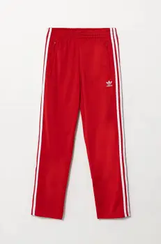 adidas Originals pantaloni de trening pentru copii culoarea rosu, cu imprimeu, IY9806 imagine