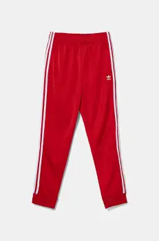 adidas Originals pantaloni de trening pentru copii SST TRACK PANTS culoarea rosu, cu imprimeu, IX7631 imagine