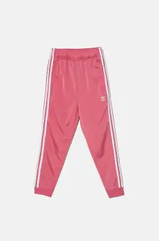 adidas Originals pantaloni de trening pentru copii SST TRACK PANTS culoarea roz, cu imprimeu, IY7462 imagine