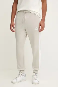 adidas pantaloni de trening Essentials culoarea bej, cu imprimeu, JE6317 imagine