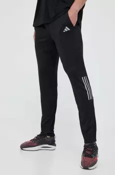 adidas Performance pantaloni de alergare Own the Run culoarea negru, cu imprimeu imagine