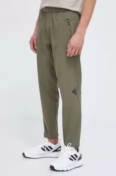 adidas Performance pantaloni de antrenament Designed for Training culoarea verde, neted imagine