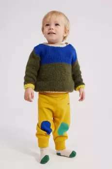 Bobo Choses pantaloni de trening din bumbac pentru bebelusi culoarea galben, neted imagine