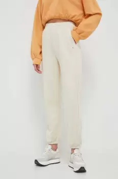 Champion pantaloni de trening culoarea bej, neted imagine