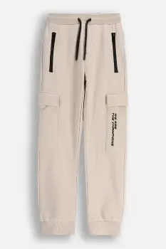 Coccodrillo pantaloni de bumbac pentru copii culoarea bej, uni, CITY RACING BOY JUNIOR imagine