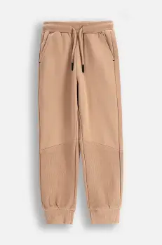 Coccodrillo pantaloni de trening din bumbac pentru copii culoarea maro, neted, MONOCHROME BOY KIDS imagine