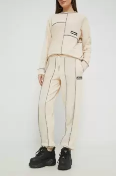 Ellesse pantaloni de trening femei, culoarea bej, neted imagine