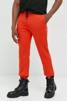 Kangol pantaloni de trening unisex, culoarea portocaliu, neted imagine