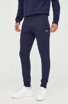 Lacoste pantaloni de trening barbati, culoarea albastru marin, neted imagine
