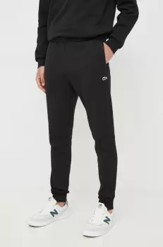 Lacoste pantaloni de trening barbati, culoarea negru, neted imagine