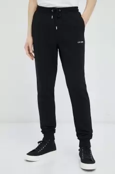 Les Deux pantaloni de trening din bumbac culoarea negru, cu imprimeu imagine