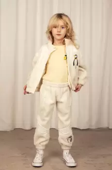 Mini Rodini pantaloni de trening pentru copii culoarea bej, cu imprimeu imagine