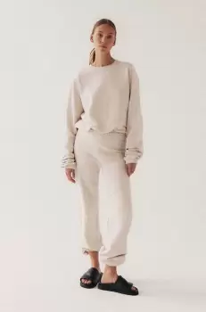 MUUV. pantaloni de trening culoarea bej, neted imagine