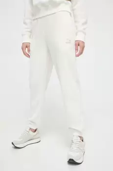 Puma pantaloni de trening culoarea bej, neted imagine