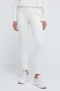 Puma pantaloni de trening din bumbac culoarea bej, neted imagine