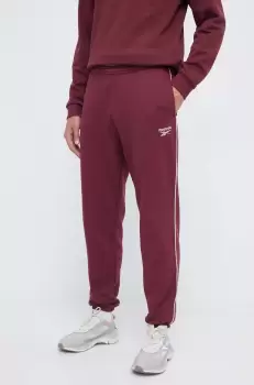 Reebok pantaloni de trening culoarea bordo, neted imagine