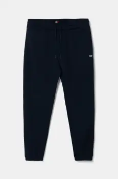 Tommy Jeans pantaloni de trening culoarea albastru marin, neted, DM0DM20473 imagine