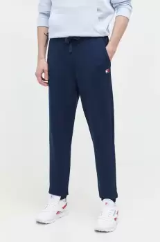 Tommy Jeans pantaloni de trening din bumbac culoarea albastru marin, neted imagine