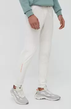 Under Armour pantaloni de trening barbati, culoarea bej, jogger imagine