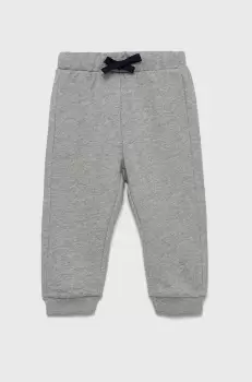 United Colors of Benetton pantaloni de trening din bumbac pentru copii culoarea gri, melanj imagine