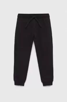 United Colors of Benetton pantaloni de trening din bumbac pentru copii culoarea negru, neted imagine