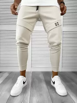 Pantaloni de trening bej conici 12180 imagine