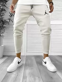 Pantaloni de trening bej conici 12361 imagine