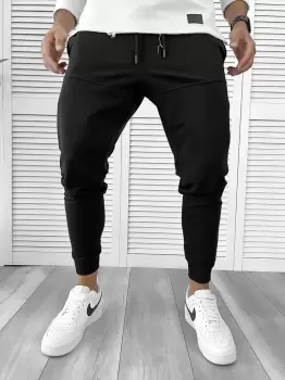 Pantaloni de trening negri conici 12110 imagine