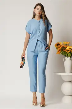 Pantaloni DY Fashion bleu din material vaporos cu elastic in talie si buzunare imagine