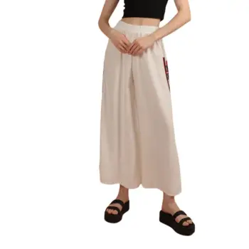 Pantaloni albi cu broderie rosie imagine