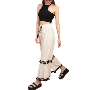 Pantaloni albi cu ciucuri negri imagine