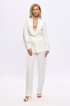 Compleu alb prevazut cu strasuri si pantaloni evazati imagine