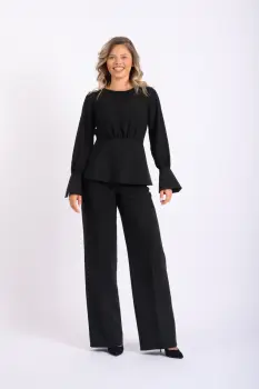 Compleu negru elegant format din pantaloni clopot si bluza cu volan la talie imagine