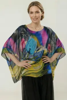 Bluza vaporoasa tip poncho din matase, croi oversized cu print lalele stilizate fond bleumarin imagine
