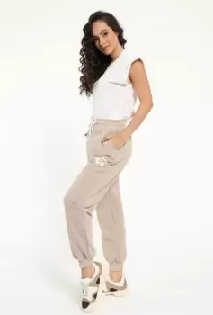 Pantaloni din bumbac bej, casual, cu floricica imagine