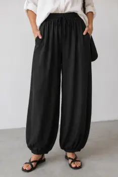 Pantaloni tip balon din lyocell cu talie elastica si buzunare, negri imagine