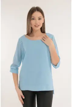 Bluza bleu din voal cu tiv asimetric imagine